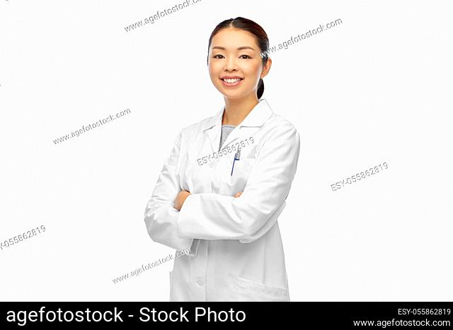 smiling asian female doctor with crossed arms