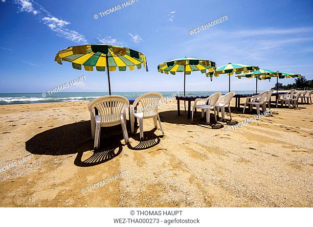 Thailand, Phang Nga, near Khuekkhak, Beach with chairs, tables and sunshades