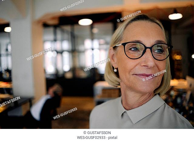 Portrait of confident mature businesswoman in office