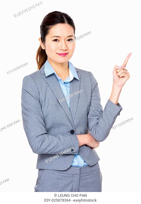 Asian young businesswoman and finger point up