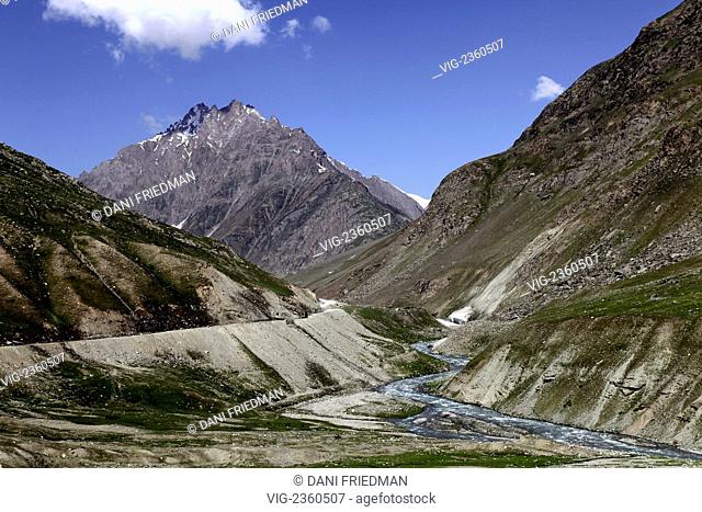 A small river runs deep in the Himalayan Mountains in Indian-controlled Kashmir. - KASHMIR, INDIA, 10/07/2010