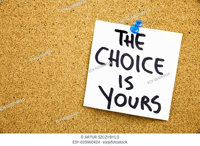 Phrase THE CHOICE IS YOURS in black ext on a sticky note pinned to a cork notice board