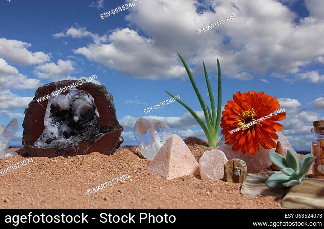 Chakra Stones and Aloe Plant on Australian Red Sand. Meditation Altar