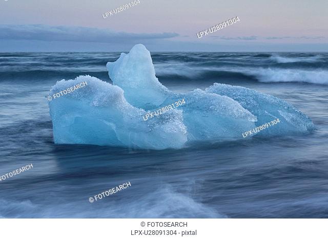 Icebergs at Jokulsarlon beach, sunset, Iceland