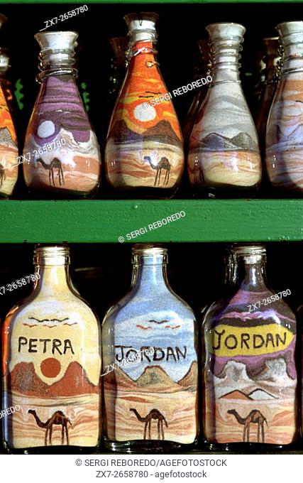 Sand-filled bottles to sell as souvenirs, Petra, Jordan. Colorful Sandbottles, a typical souvenir from Jordan, displayed in a shop at the entrance of Petra