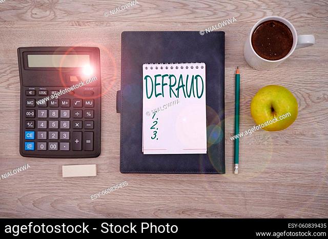 Conceptual caption Defraud, Internet Concept to trick or cheat someone or something in order to get money Blank Notebook Page With A Calculator And Geometric...