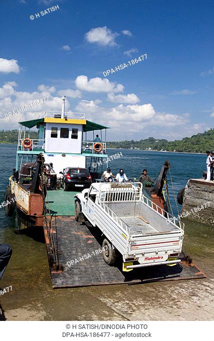 ferry boat carrying vehicle in Chatham Jetty Port blair Andaman island India Asia