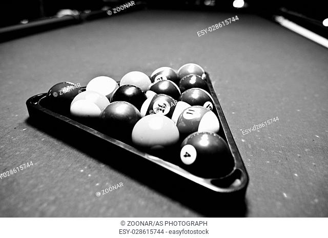 Billiard balls in a pool table at triangle