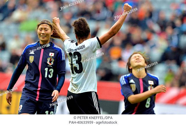 Germany's Celia Okoyino Da Mbabi (C) celebrates after scoring the 3-1 during the Women's international friendly soccer match Germany vs Japan at Allianz Arena...