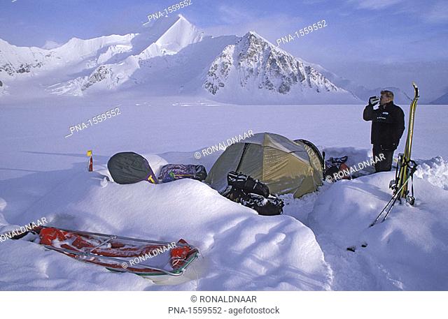 Base camp at the Kronberg Glacier, East Greenland, 70 degrees north, just after heavy snow fall