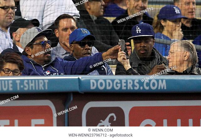 Celebrities attend the Los Angeles Dodgers game Featuring: George Lopez, Arsenio Hall Where: Los Angeles, California, United States When: 27 Apr 2016 Credit:...