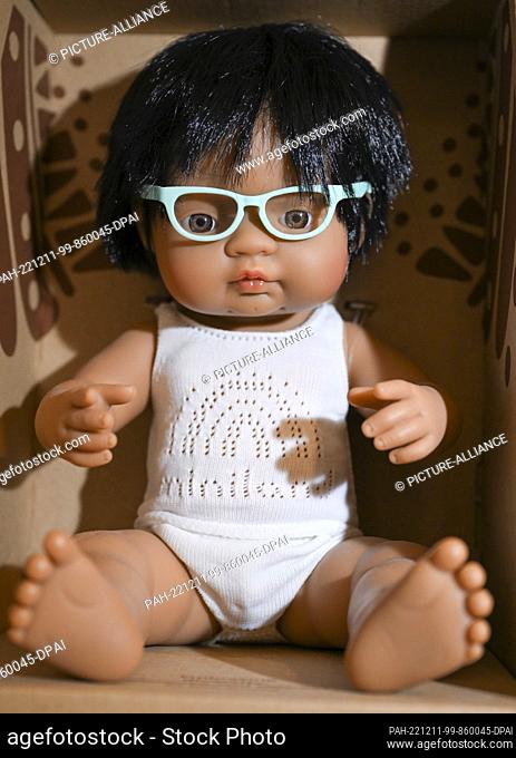 01 December 2022, Berlin: Diverse dolls, including a child with glasses, are part of the assortment at the Diversity Spielzeug store on Emser Strasse in...