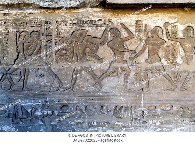 Wrestling and single-stick fighting, relief in the hypostyle hall, Mortuary Temple of Ramesses III, Medinet Habu, Thebes (UNESCO World Heritage List, 1979)