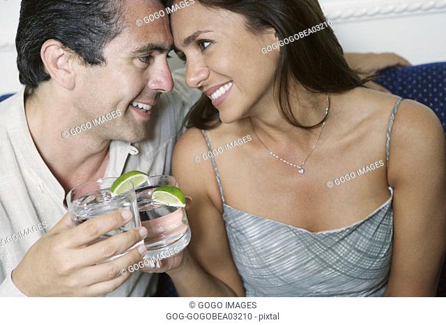 Couple toasting each other