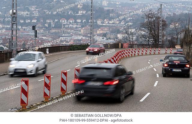 Cars drive on a the Weinsteige street during the first particulate matter alert 2018 in Stuttgart, Germany, 08 January 2018