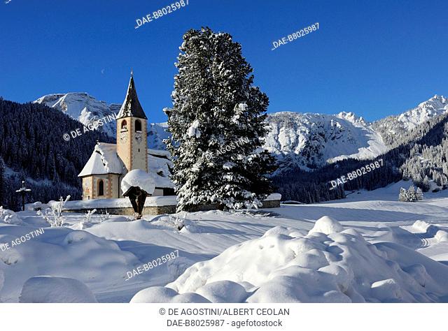 The Church of Saint Vitus in winter, Platzwiese, Prags, Puster Valley, Trentino-Alto Adige, Italy, 14th century