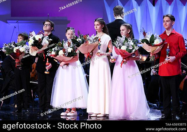 RUSSIA, MOSCOW - DECEMBER 12, 2023: Winners in the string category, violinist Alexander Kolesnikov (bronze), Vasilisa Sokolova (silver)