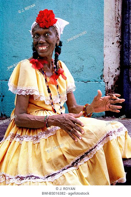 old Cuban woman druggy by smoking marihuana joint, Cuba