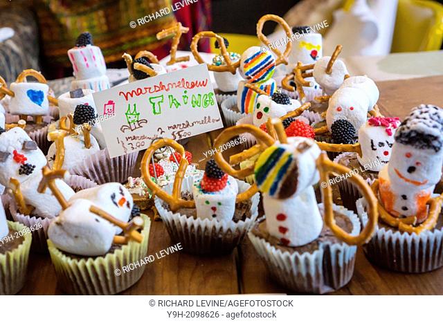 Homemade cupcakes for sale at a charity bake sale in New York