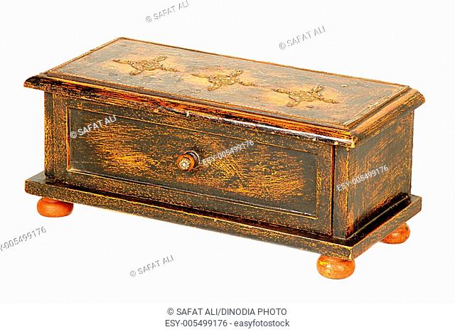 Brass design fitting on orange wooden box ; Jodhpur ; Rajasthan ; India
