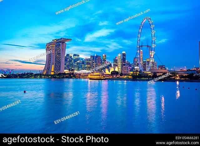 Singapore city skyline at twilight with view of Marina Bay