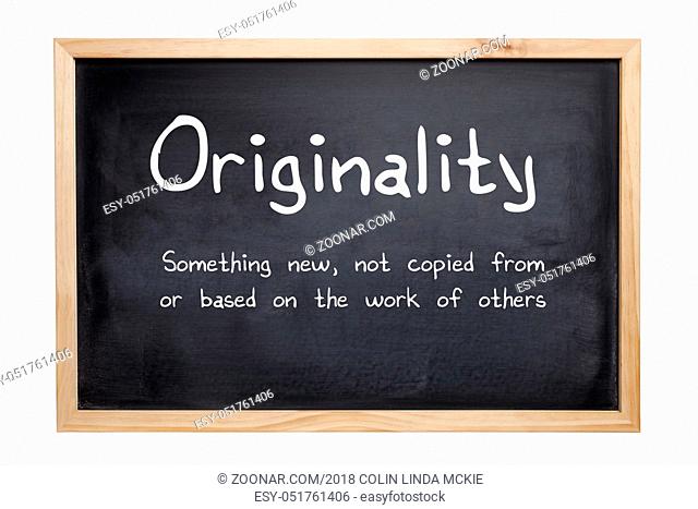 Originality Concept - a blackboard with the words originality, something new, not based on or copied from the work of others. Clipping path for board