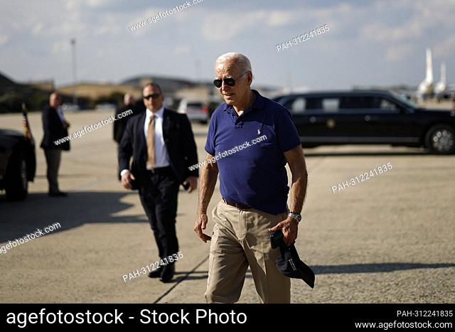 United States President Joe Biden walks on the tarmac before boarding Air Force One at Joint Base Andrews, Maryland, on Friday, Aug. 26, 2022