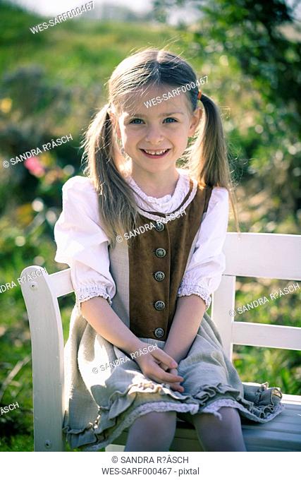 Portait of little girl wearing country style dress