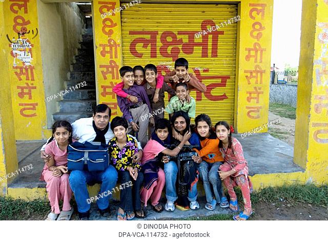 South Asian Author Sarayu Ahuja  and photographer Pradeep chandra with Hindu Kashmiri children in Jammu ; India NO MR