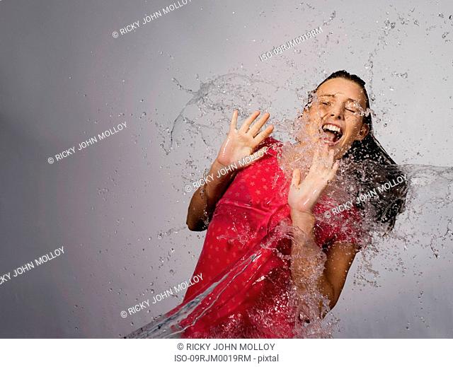 Woman splashed with water