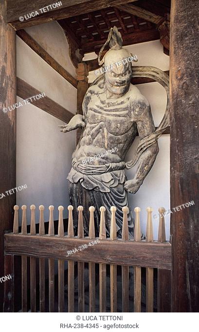 Guardian figure at Horyuji Temple, which contains the world's oldest wooden structures, Nara, Japan, Asia