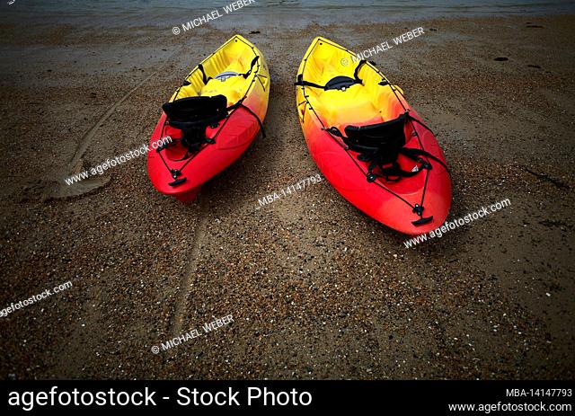 kayaks, on the beach at ploumanac'h, cote de granit rose, cotes d'armor, brittany, france