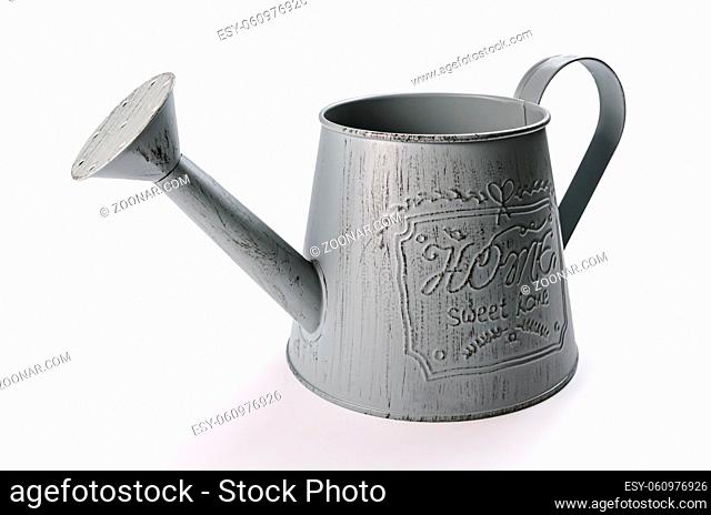 decorative garden watering can on white background with soft shadow