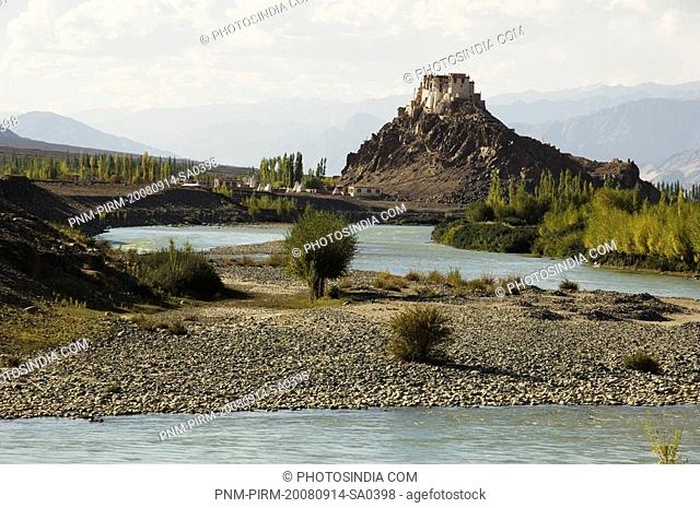 River with monastery in the background, Stakna Monastery, Indus River, Ladakh, Jammu and Kashmir, India
