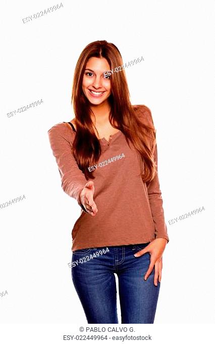 Smiling latin young woman extending handshake