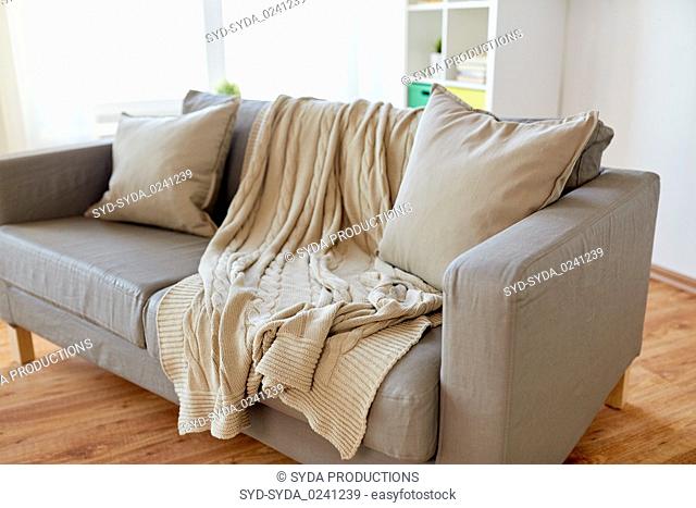 sofa with cushions at cozy home living room