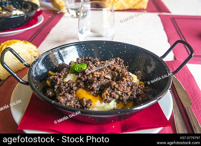 Morcilla with fried eggs and fried potatoes. Spain