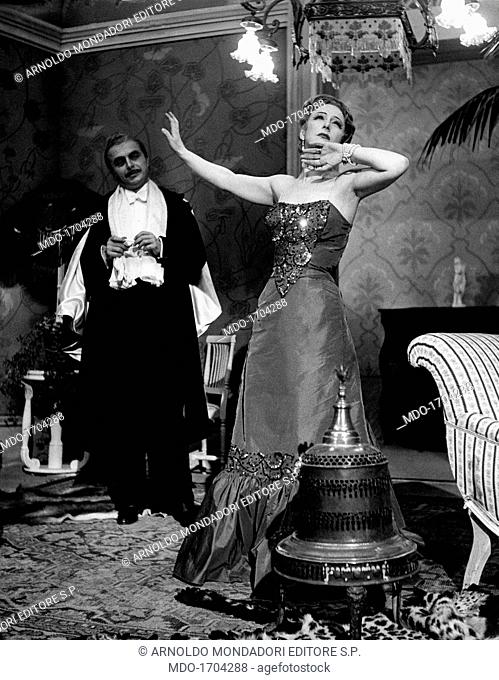Lilla Brignone dances in Lulù. Italian actress Lilla Brignone, born Adelaide Brignone, dances inside an opulent room in a scene from Lulù by Carlo Bertolazzi