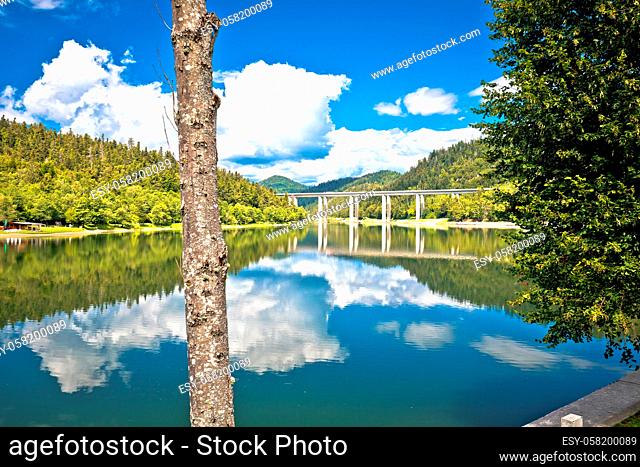 Idyllic Bajer mountain lake and highway A6 viaduct view, Gorski Kotar region of Croatia