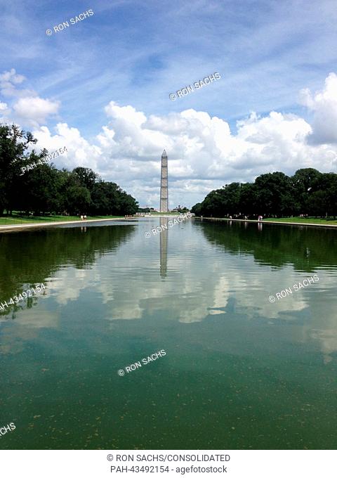 Washington Monument from the western edge of the Reflecting pool showing the scaffolding in place, in Washington, D.C., USA, 14 July 2013