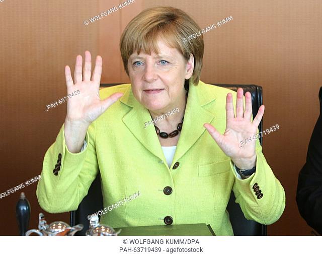 FILE - An archive picture dated 16 July 2014, shows German Chancellor Angela Merkel (CDU) during a government cabinet meeting at the chancellery in Berlin