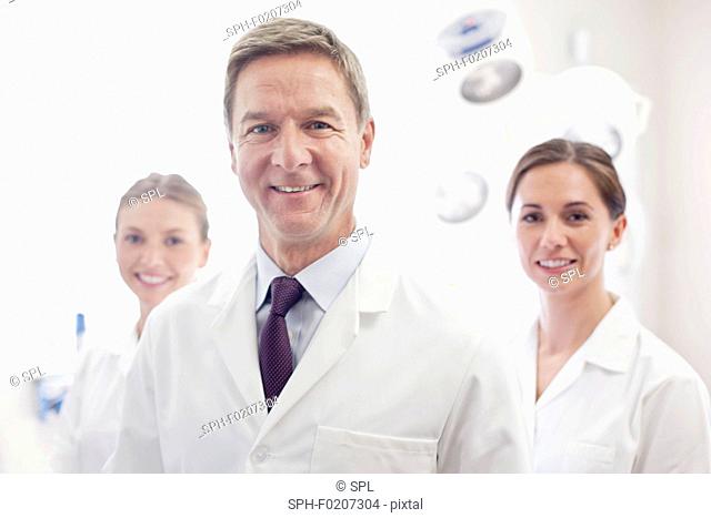 Male doctor smiling