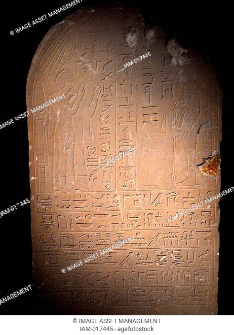 Stela of princess Paabtameri. 25th Egyptian dynasty The princess is depicted in supplication to teh God ra-Harakte on an Egyptian stela