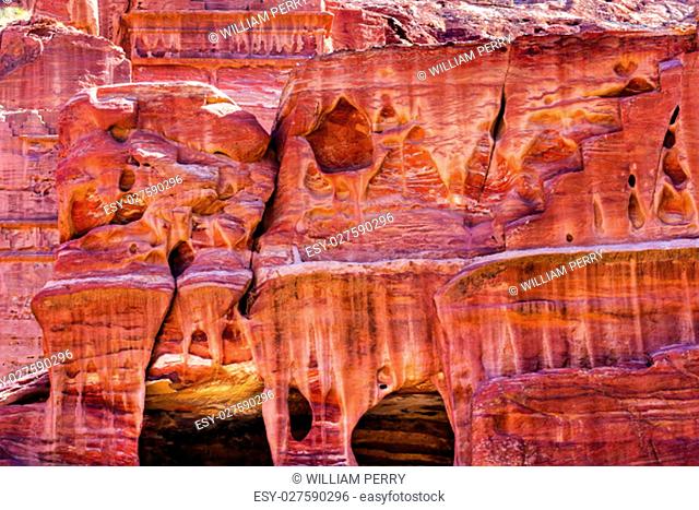 Rose Red Rock Tomb Street of Facades Petra Jordan. Built by the Nabataens in 200 BC to 400 AD. Rose Red canyon walls create many abstracts close up