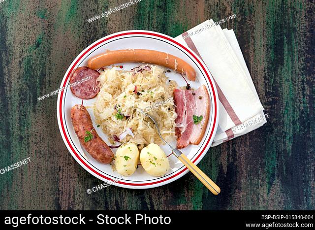 Choucroute garnie, a typical alsacian plate, with sausages, bacon, sauerkraut and potatoes