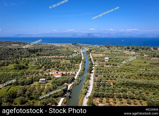 Aerial drone view of channel and Ionian shore in Lefkimmi town on the island of Corfu, Greece