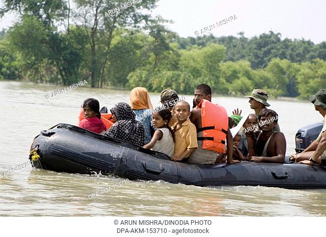 BSF force undertaking rescue operation ; Kosi river flood in year 2008 ; Purniya district ; Bihar ; India