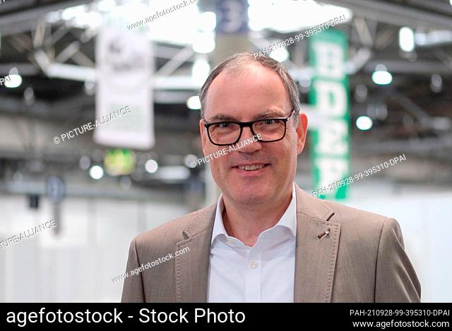 28 September 2021, Saxony, Leipzig: Martin Buhl-Wagner, Managing Director of Leipziger Messe, stands in an exhibition hall
