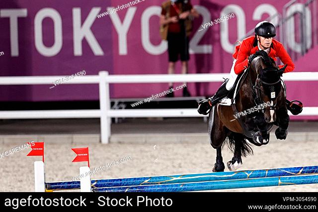 Belgian Equestrian jumping rider Jerome Guery and his horse Quel Homme de Hus pictured in action during the qualifications for the jumping competition on day 12...
