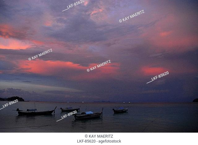 Evening sky and boats near the beach near Ko Lipe, Satun, Thailand